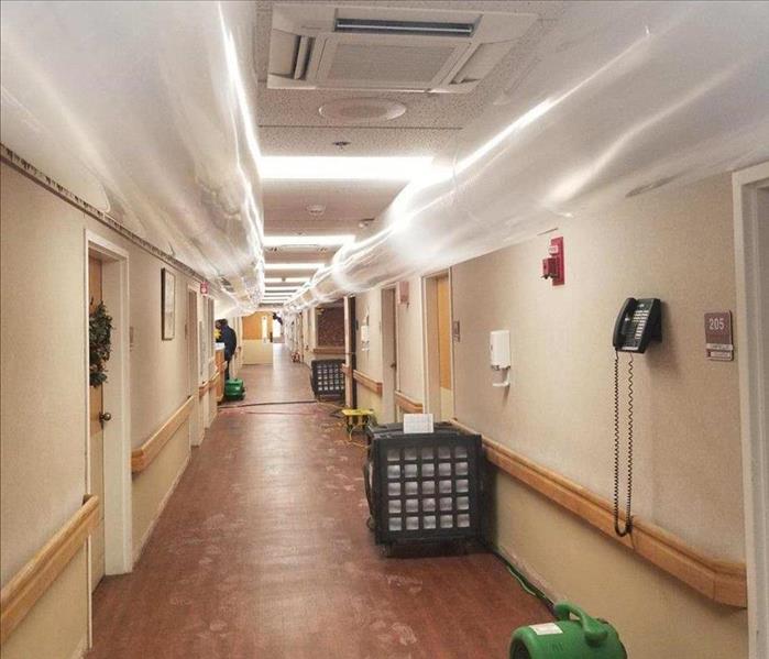 hallway of a hospital with water damage