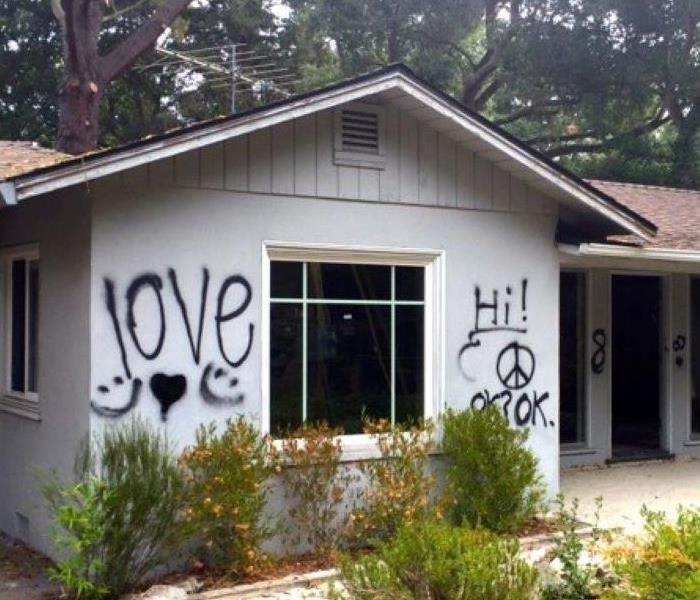 house with graffiti on it